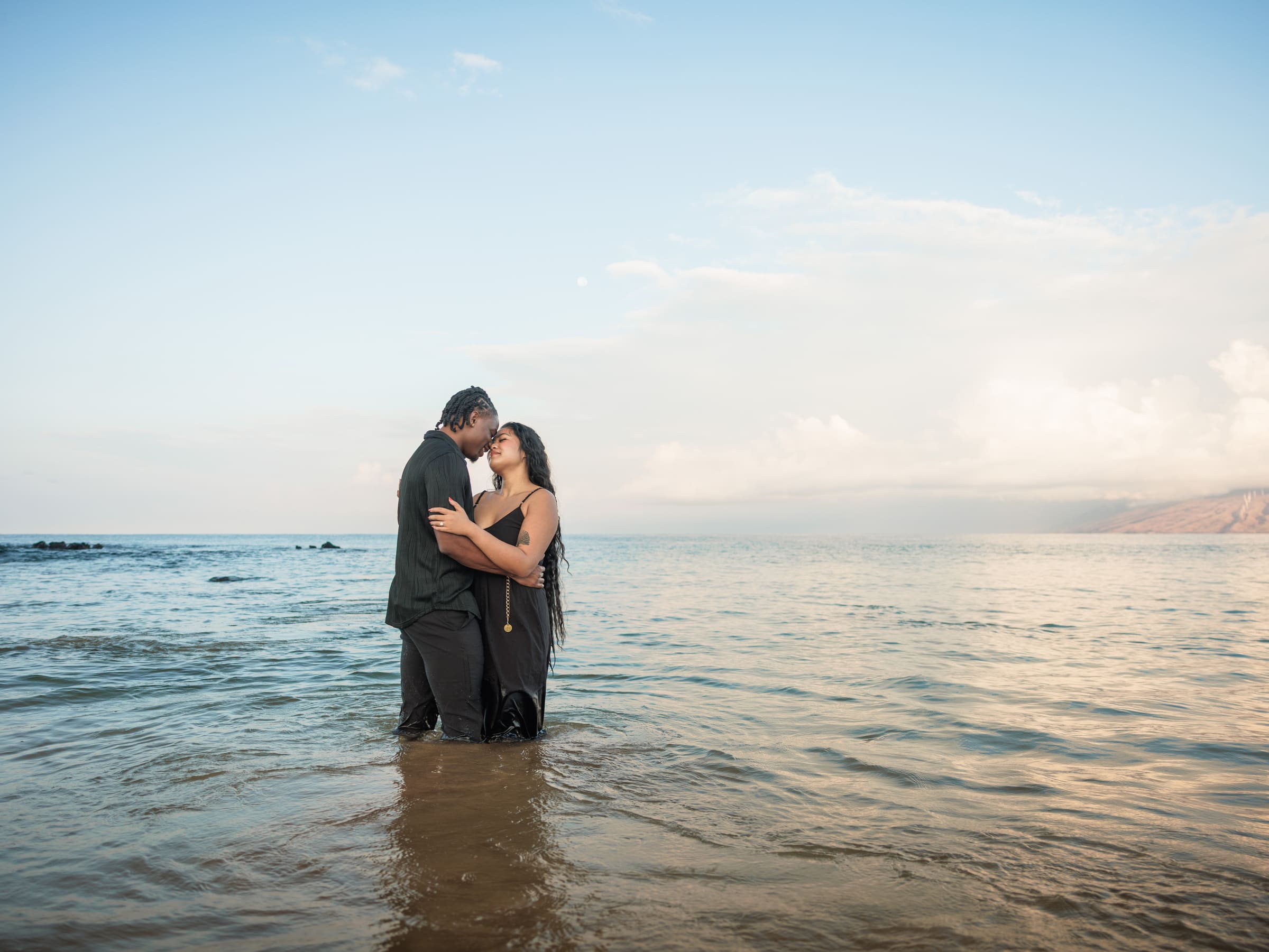 Allene and Victor sharing a moment at sunrise